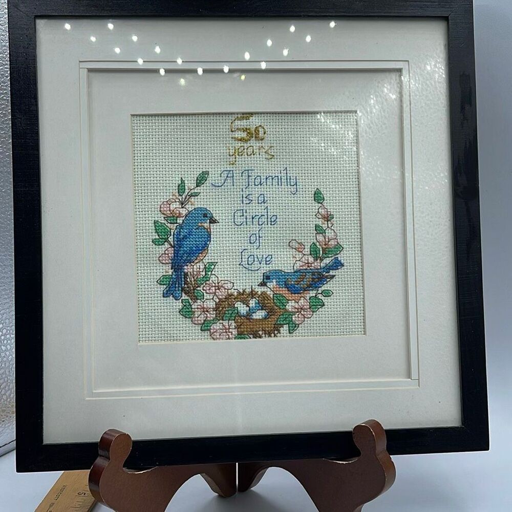 50 years anniversary -a cross stitch with robins in a nest.